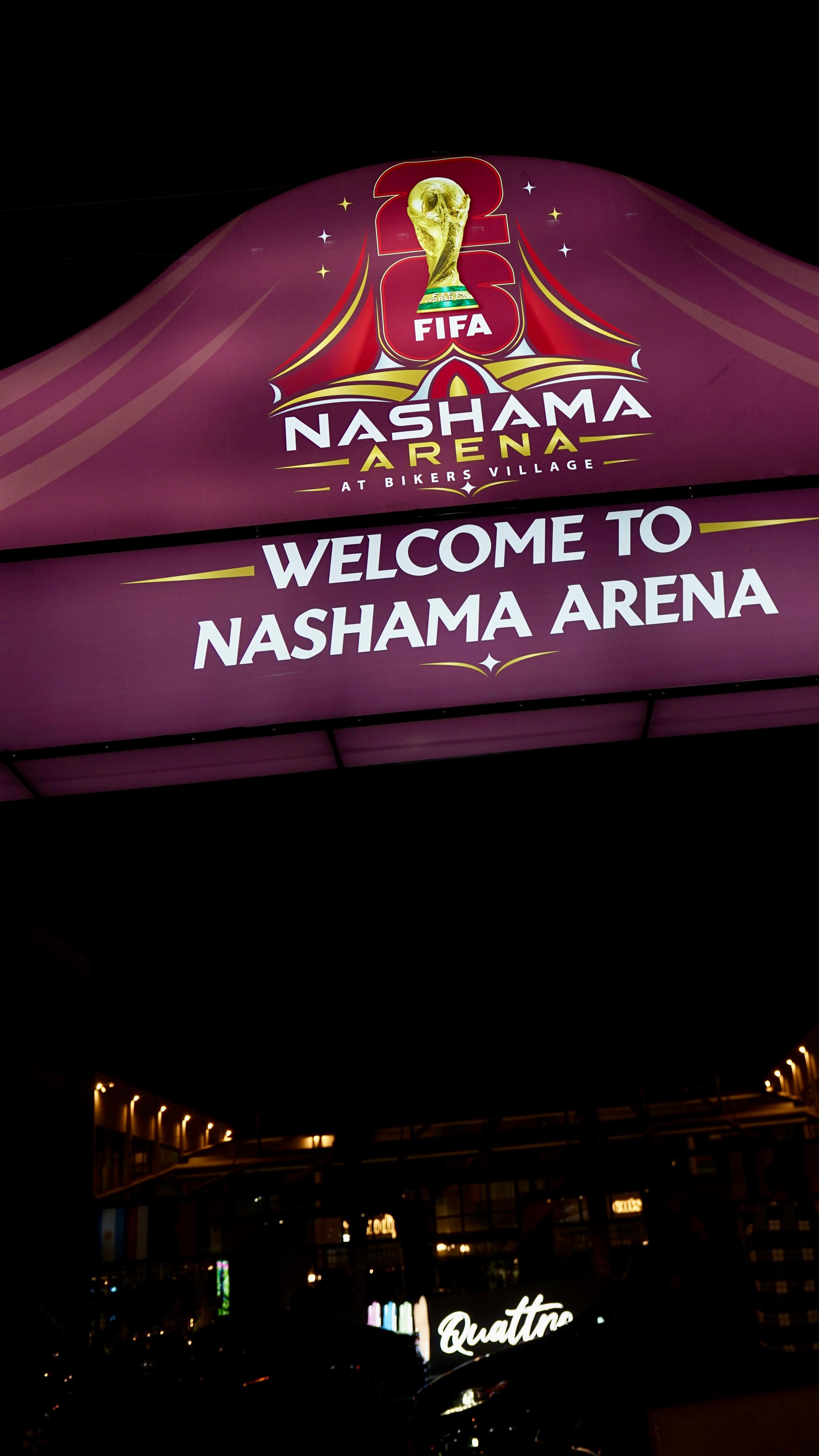 Nashama Arena welcome sign at night